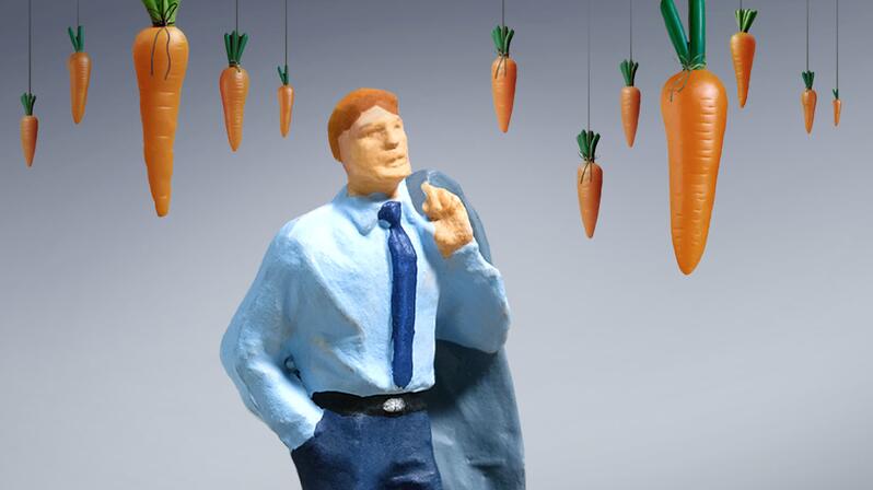 Interim managers surrounded by benefits, presented as carrots.
