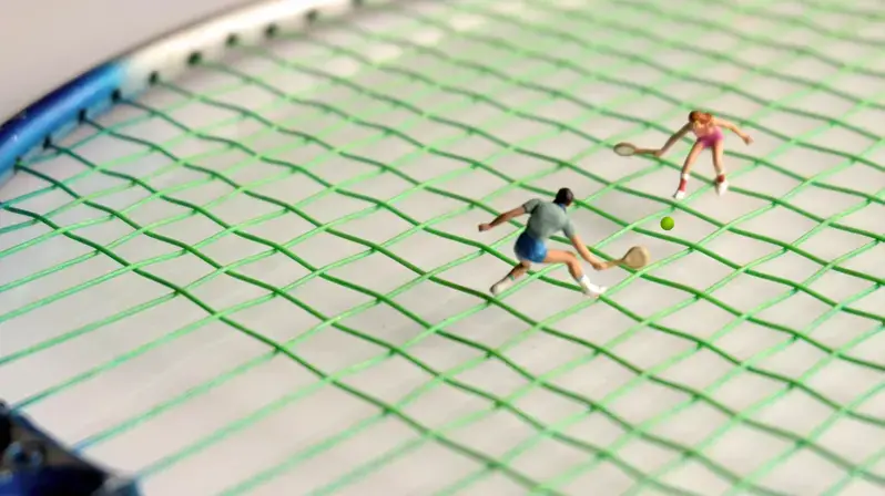 Planning coaching correctly: The picture shows figures playing tennis on a tennis racket.