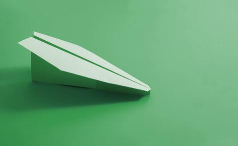 A paper airplane as a symbol for the content of the article.